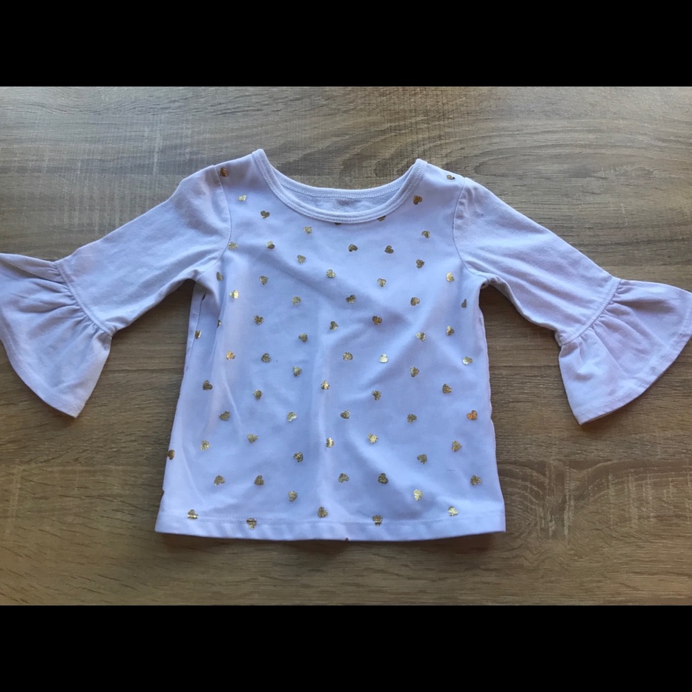 Cute white ruffle top!
